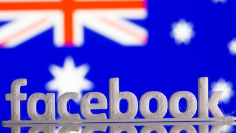 Facebook logo over an Australian flag