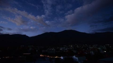 View of the Chacao neighborhood during a partial power cut in Caracas on February 6, 2018