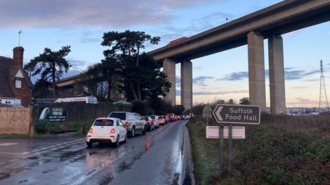 Traffic queuing beneath the Orwell Bridge