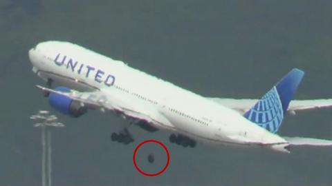 Plane with wheel falling off