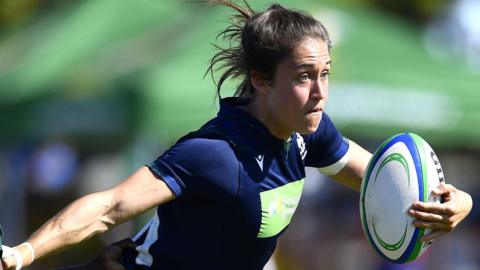 Scotland's Rhona Lloyd runs with the ball