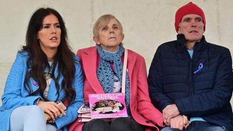 Bernadette Mother of Natalie McNally and Father Noel with family members as Hundreds of people are gathered in Lurgan for a rally in memory of Natalie McNally,