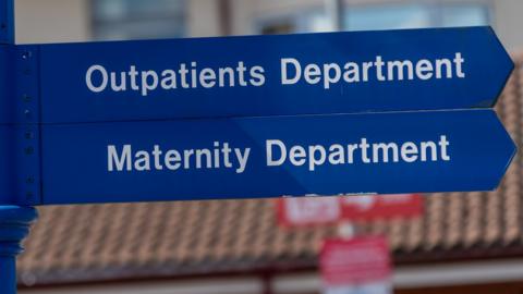 Maternity and outpatients department signs