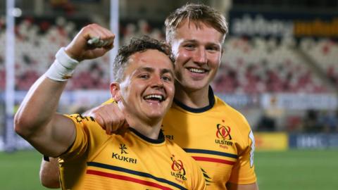 Mike Lowry and Stewart Moore celebrate after the game