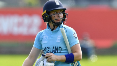 Heather Knight walks off after being dismissed