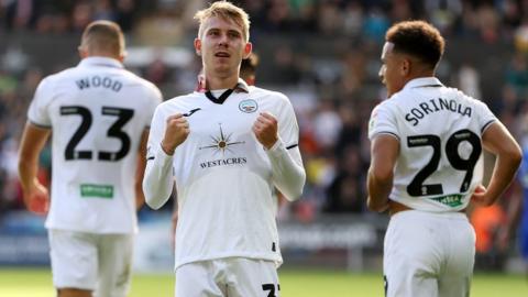 Ollie Cooper celebrates