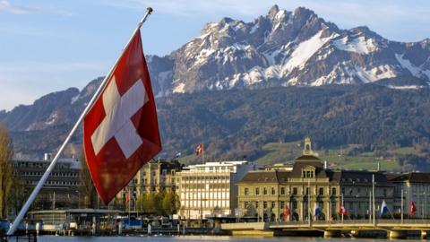 A Swiss flag in the Swiss city of Lucerne