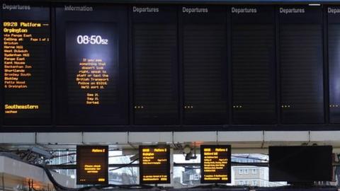Blank train timetable display screens at Victoria train station, central London, as rail passengers are hit by disruption on the first working day of the year