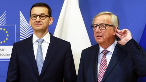 Polish Prime Minister Mateusz Morawiecki (left) in Brussels