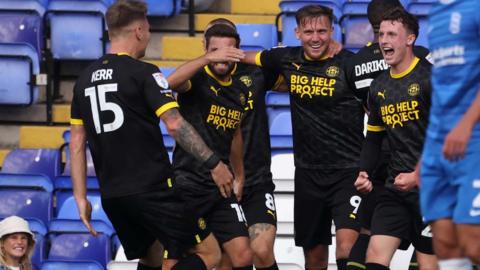 Wigan celebrate their goal against Birmingham City