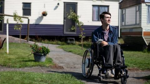 George Robinson playing his character Isaac