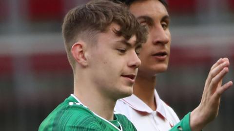 Conor Bradley (left) earned his first Northern Ireland senior cap in Sunday's 3-0 friendly win over Malta in Austria