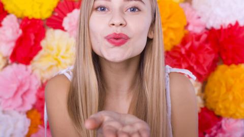 Girl blowing kiss