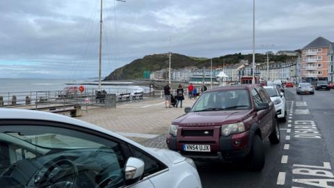 cars parked alongside the promenade in Aberystwyth
