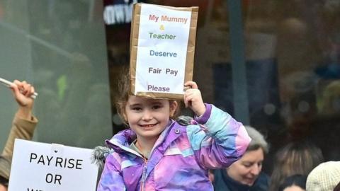 A young girl at a protest in Belfast
