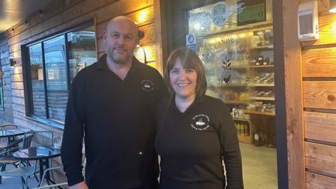 Nigel and Rachel wearing black