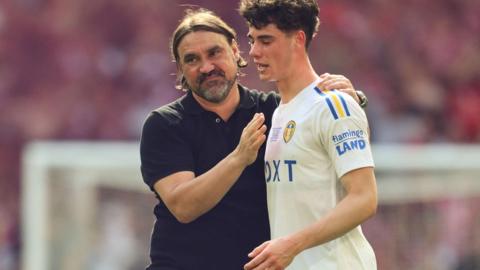 Leeds boss Daniel Farke consoles teenage midfielder Archie Gray after the full-time whistle of the Championship play-off final