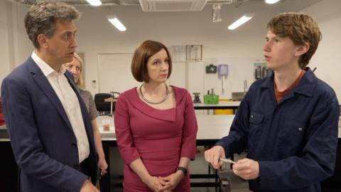 Ed Miliband and Bridget Phillipson with a student