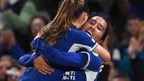 Chelsea player Mayra Ramirez celebrates with team-mate Guro Reiten after their first goal against Ajax in the Women's Champions League quarter-final second leg