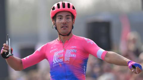 Alberto Bettiol celebrates after winning the Tour of Flanders