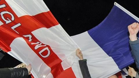 Fans held flags of both England and France at Wembley