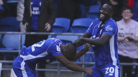 Cardiff players celebrate their equaliser against Southampton