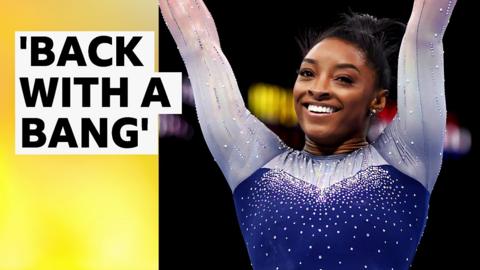 Simone Biles celebrates after floor routine