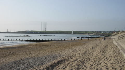A view from Aberdeen beach looking towards oil platforms in Nigg Bay