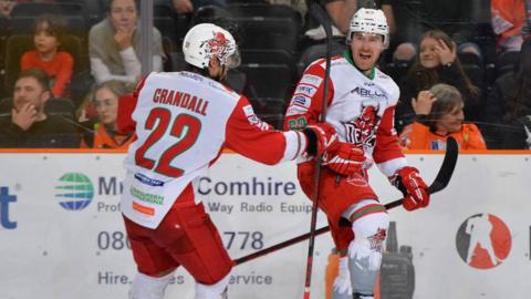 Trevor Cox and Justin Crandall celebrate Cox’ opening goal