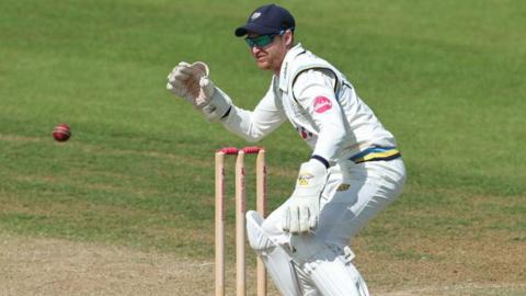 Wicketkeeper Jonny Tattersall in action.