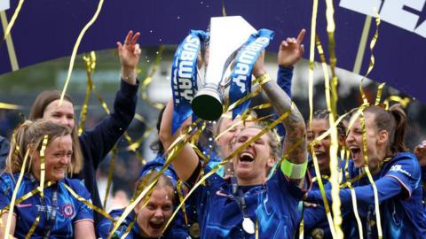 Chelsea winning the trophy in 2025.