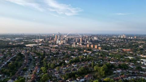 Aerial view at sunrise of Wembley, London.