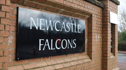 Newcastle Falcons sign on wall