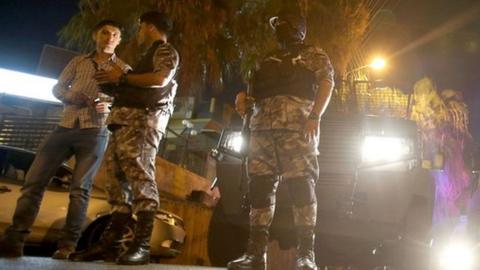 Security forces stand guard outside the Israeli embassy in the residential Rabiyeh neighbourhood of the Jordanian capital Amman following an "incident" on July 23, 2017