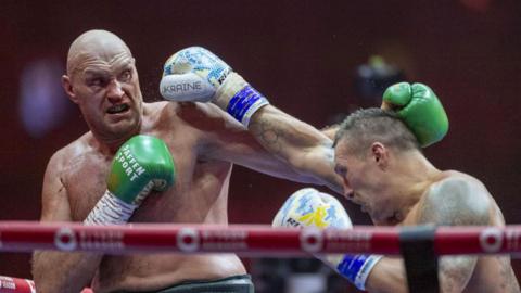 Oleksandr Usyk throws a jab at Tyson Fury