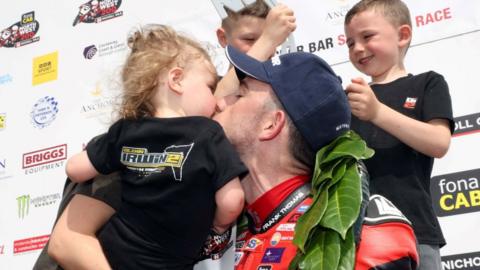 Glenn Irwin with children Freddie, Carter and Gia