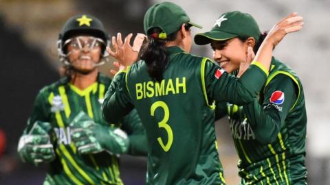 Pakistan's Bismah Maroof (C) celebrates with teammates after the dismissal of Ireland's Laura Delany (not seen) during the Group B T20 women's World Cup cricket match between Pakistan and Ireland at Newlands Stadium in Cape Town