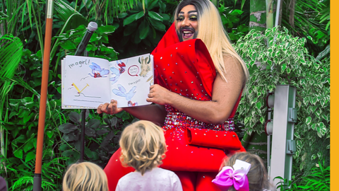 Drag artist The Nightbus reads to children at a Drag Queen Story Time event in Liverpool. She thinks it's important that children hear stories that represent people of colour.