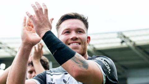 Yusuf Aydin claps the Hull FC fans during the 2024 Super League season