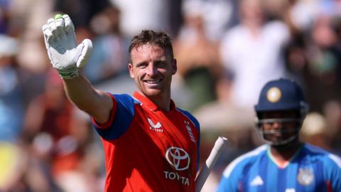 England batter Jos Buttler celebrates hitting a century