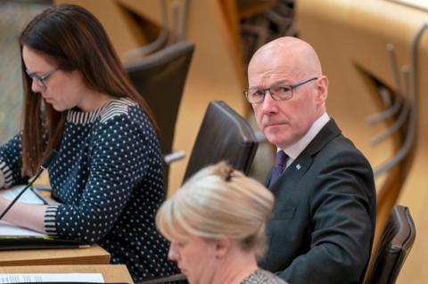 John Swinney fields questions from opposition party leaders during  FMQs