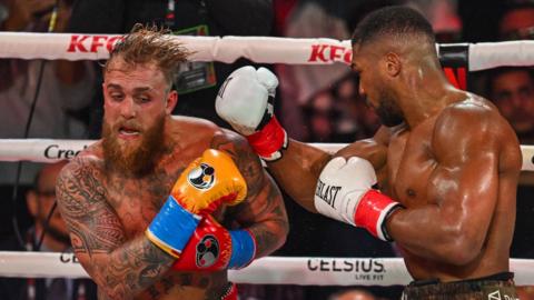 Anthony Joshua punches Jake Paul