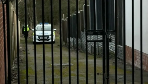 A police car near the scene