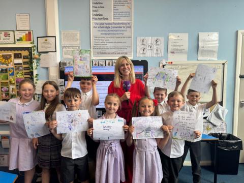 Jenny and school children learning about allergies