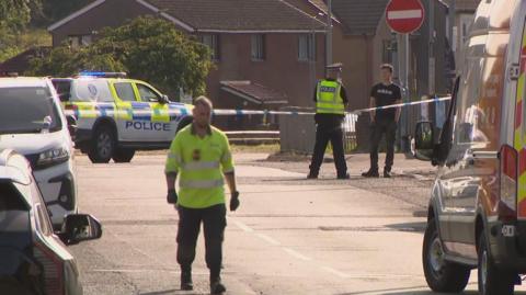 Police cordon on a road