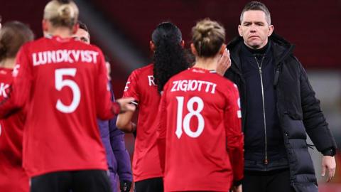 Marc Skinner and Man Utd players after their Women's Champions League exit last season