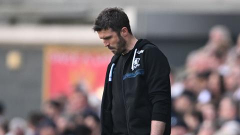 Michael Carrick looks down