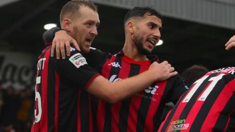 Truro City players celebrate