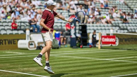 Denis Shapovalov in action at Wimbledon 