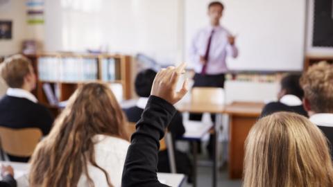 teacher in classroom